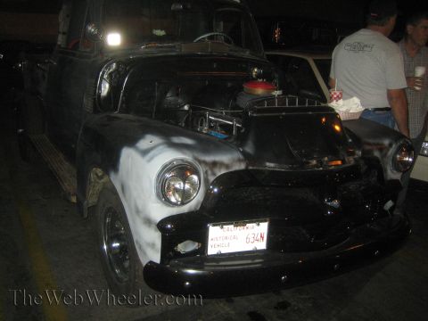 1968 Ford Mustang - This black pickup truck is shown from the front with its hood open, displaying a California historical vehicle license plate.