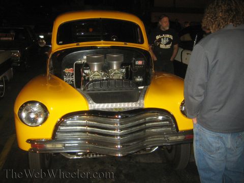 1968 Ford Mustang - This yellow hot rod truck does not appear to be a 1968 Ford Mustang.