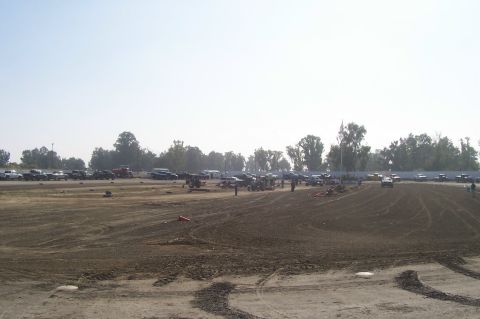 1994 Ford F-150 - A large gathering of vehicles parked in an outdoor lot.