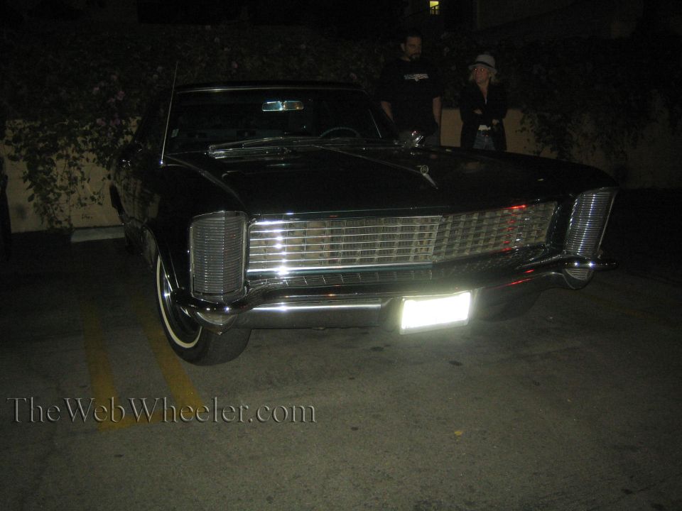1965 Buick Riviera front view, parked at night