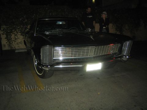 1968 Ford Mustang - A classic Buick Riviera is parked at night, showing off its distinctive grille and front-end design.