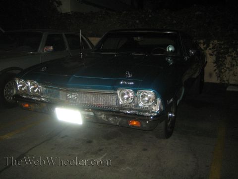 1968 Ford Mustang - The front view of a teal 1969 Chevrolet Chevelle SS shows its distinctive grille and dual headlights.