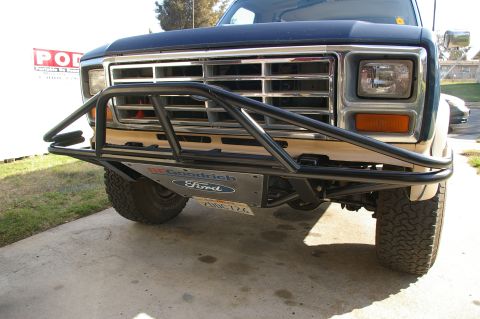 1986 Ford Bronco - Custom prerunner bumper on a 1986 Ford Bronco, BF Goodrich tires and a prominent Ford grille.