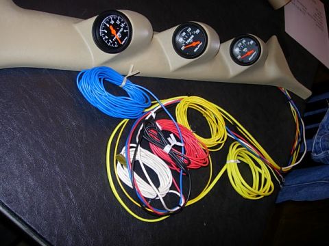 1993 Ford Bronco - Gauge pod and wiring kit, likely for aftermarket installation in a vehicle.