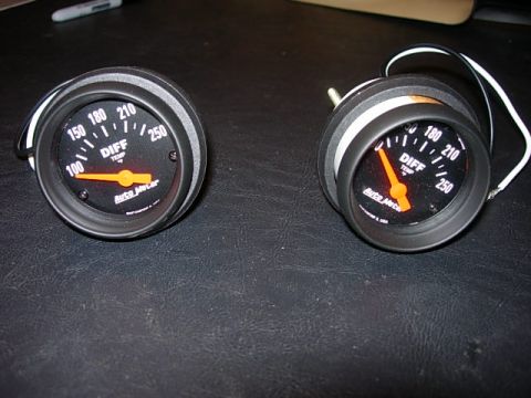 1993 Ford Bronco - Two AutoMeter gauges are shown, each displaying differential temperature readings.