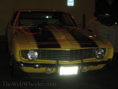 1968 Ford Mustang - This 1969 Chevrolet Camaro Z28 features a distinctive yellow paint job with dual black racing stripes.