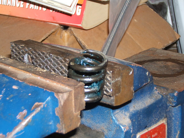 Had to shave off about a 1/2 an inch of the spring with the longer axle shafts.