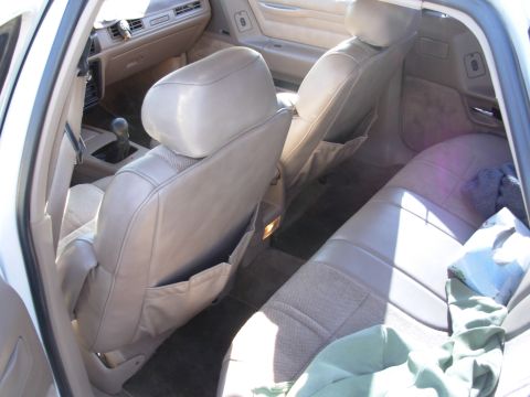 1995 Ford Taurus - Interior view of a 1995 Ford Taurus, highlighting the seating and dashboard details.