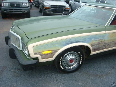 1973 Ford Ranchero - This 1970s Ford Ranchero features distinctive woodgrain paneling on its side.