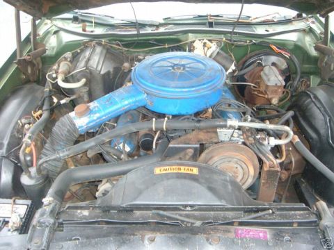 1973 Ford Ranchero - Engine bay of a 1973 Ford Ranchero, showing the air cleaner and fan shroud.