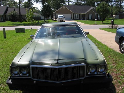 1973 Ford Ranchero - Front view of a 1973 Ford Ranchero, showing its distinctive grille and headlights.