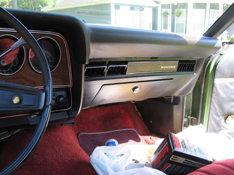 1973 Ford Ranchero - The interior of a 1973 Ford Ranchero shows the dashboard with "Squire" badging and woodgrain trim.