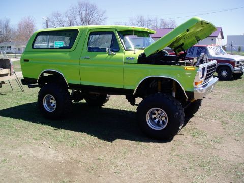 1986 Ford Bronco - This modified first-gen Ford Bronco is a real head-turner with its bright green paint and lifted suspension.