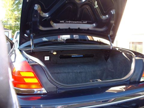 2000 Ford Crown Victoria - My trunk with the 2 amplifiers installed.