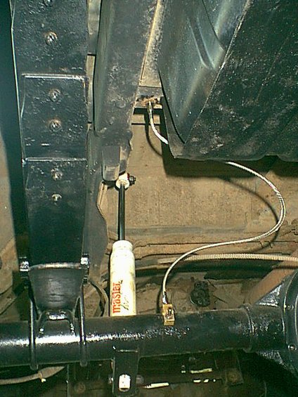 1983 Ford Bronco - here you can see where the line connects to the frame. it is the same line as the stock rubber line.