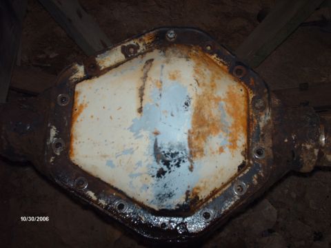 1990 Ford F-150 - Close-up of a rusty differential housing, likely from a truck or SUV.