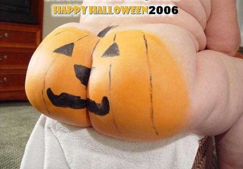 2000 Ford Crown Victoria - Pumpkins painted on skin with "HAPPY HALLOWEEN 2006" text above.