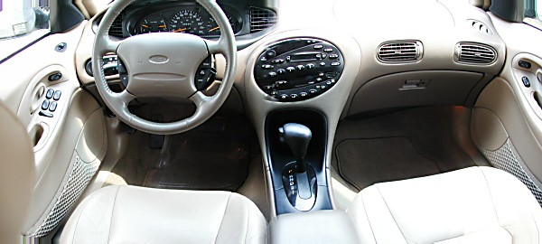 Panoramic of front seats/dash. I loooove my leather interior.