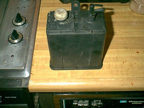 1983 Ford Bronco - Here is the front side of the can. it is ready to go in. this connects to the vaper recovery line in the fuel tank and then to the perge va…
