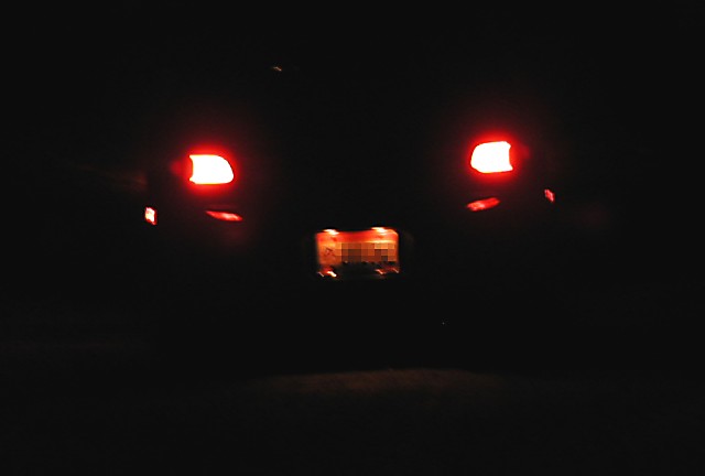 UFO moving away at high speed . . . wait a sec, that UFO has an Ohio license plate!