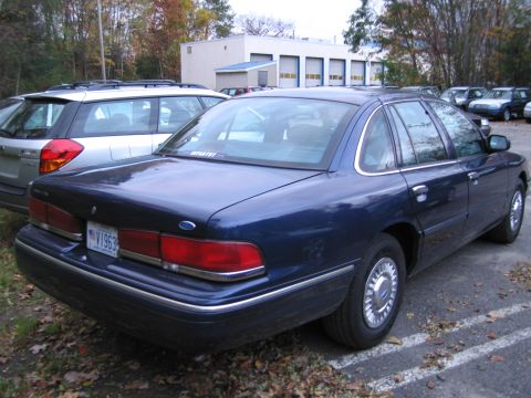 1991 Ford LTD Crown Victoria - Rear view of a blue 1991 Ford Crown Victoria LTD sedan in a parking lot.