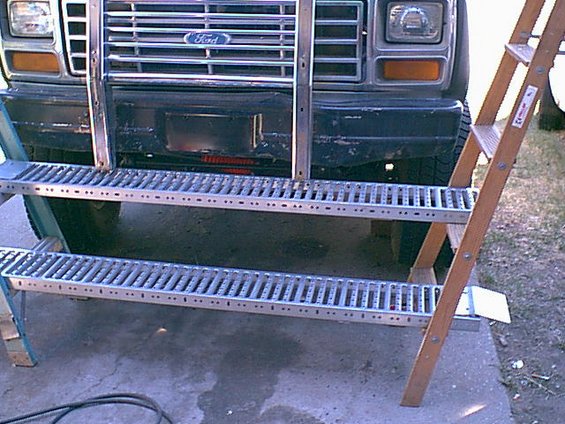 the bronco got so tall i needed a work platform to stand on to ork on it.this is my motorcycle ramps and 2 ladders. works great.