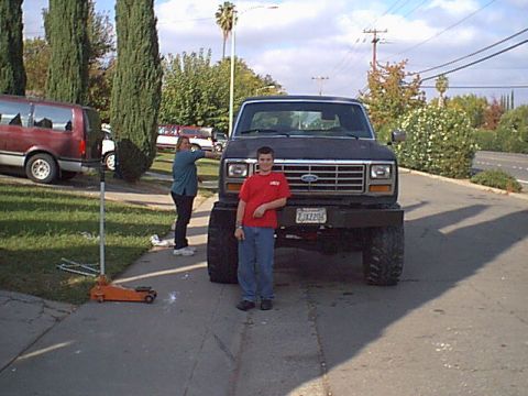 1983 Ford Bronco - Here is my sexy wife and josh just after the new shoes went on.