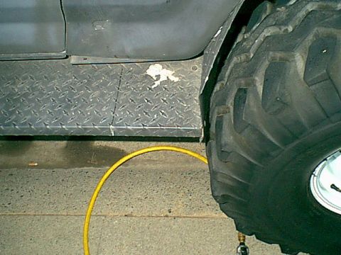 1983 Ford Bronco - The only thing i had to trim to fit the bigger tires were the side steps. you can see where i want to cut the step at.