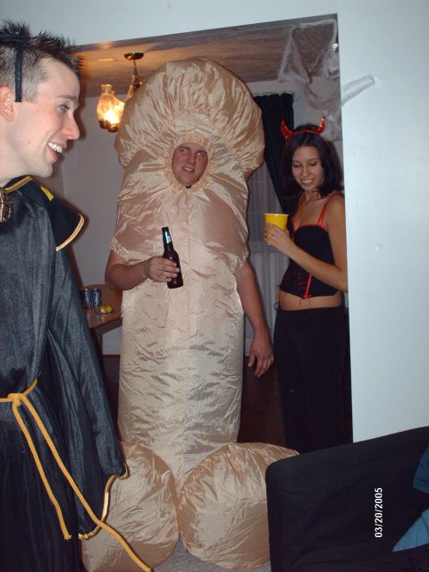 1995 Ford Probe - People in costumes at a party, one person wears an inflatable penis costume.