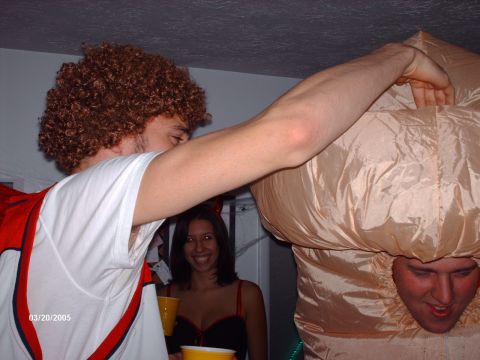 1995 Ford Probe - People in costumes celebrate at a party on March 20, 2005, with a watermark from Supermotors.net visible.
