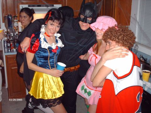 1995 Ford Probe - A group of friends dressed in Halloween costumes pose for a photo at a party.