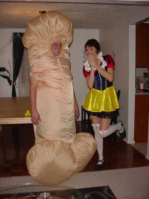 1995 Ford Probe - Two people in costumes pose for a photo indoors.