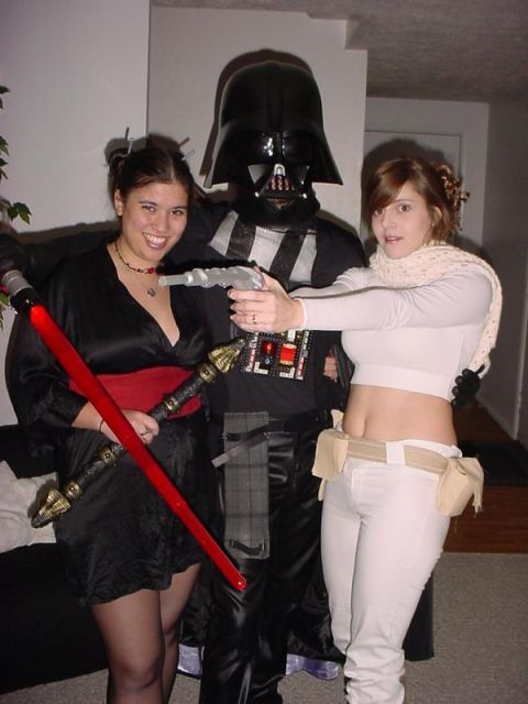 1995 Ford Probe - Three people dressed as Star Wars characters pose for a photo, likely for Halloween.