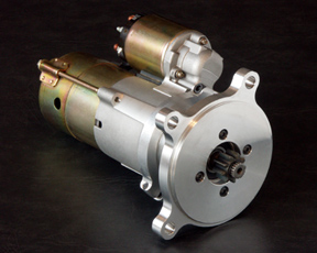 1972 Ford Ranchero - Close-up of an automotive starter motor, branded with SuperMotors.net.