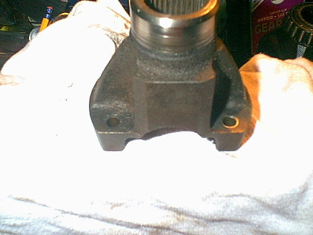 The cv joint gets bolted to this to the transferecase.