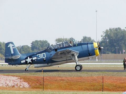 1998 Ford Taurus - Grumman TBM-Avenger. Warming engine for take-off.