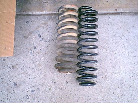 1983 Ford Bronco - here is the pass side new and old spring.