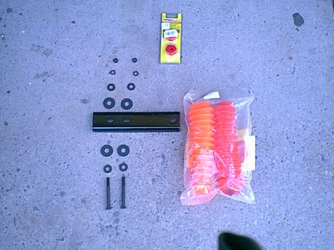 1983 Ford Bronco - Here are all the parts for the new mount. new poly end links, new boot, mount, and bolts.