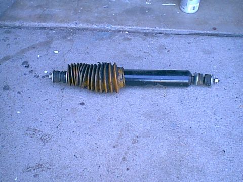 1983 Ford Bronco - This is the stablizer the boot is old and beatup but the shock was new. as were the bushings. i decided to replace the bushings with poly a…