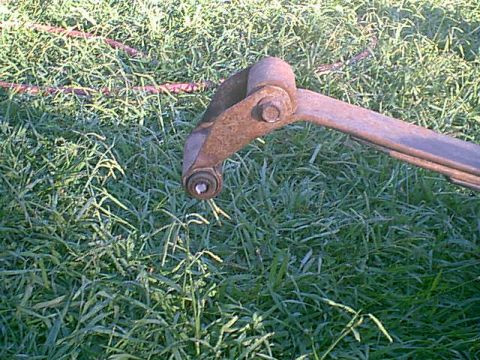 1983 Ford Bronco - i had to cut the bolt head off to get the shackle and spirng off the trick. this is a common issue.