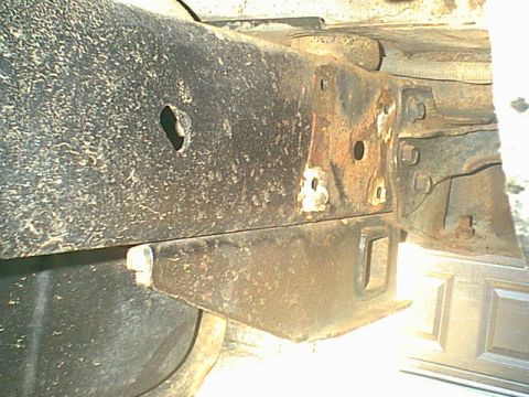 1983 Ford Bronco - there is no easy way to remove rivet. i tried the heating, cutting the head off and punching them out. Here is the drivers side rear frame…
