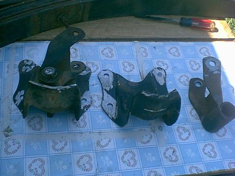 1983 Ford Bronco - i found i had to cut the spring out and then grind off the rivets and beat them out. lots of noise and no fun. here are the stock mounts an…