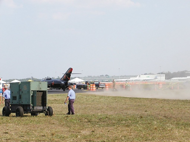 MiG-17 throttling-up to taxi to runway.  Seconds after this picture, he really poured on the power and kicked-up a huge cloud of dust and dirt.
