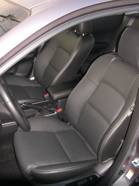 1997 Ford Probe - Interior view of a car's front seats and center console.