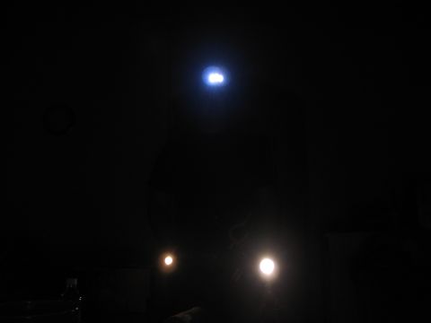 1995 Ford Bronco - A person is visible in the dark, lit by a headlamp and two other light sources.
