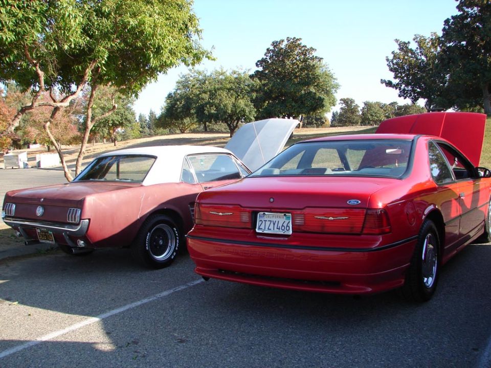 Red 1992 Ford Thunderbird rear view with license plate 2TZY466