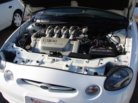 1992 Ford Taurus - The V8 32-valve engine of a 1992 Ford Taurus SHO is displayed with the hood open.