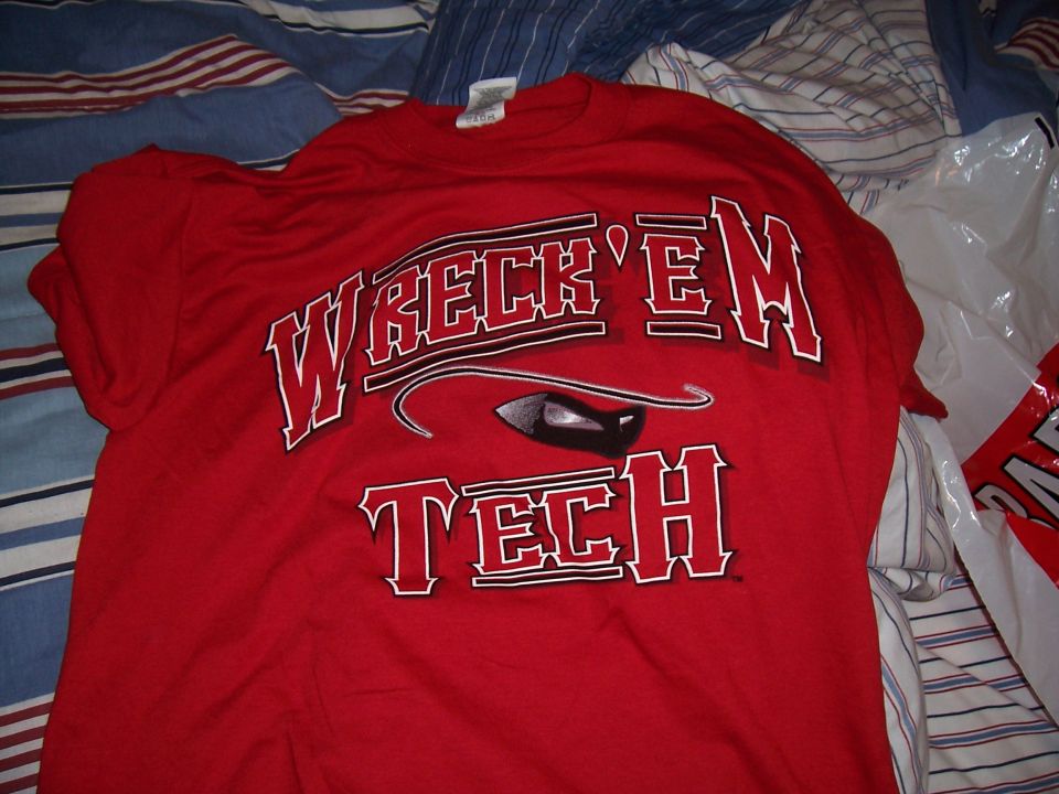 Red t-shirt with "WRECK 'EM TECH" text and a black graphic