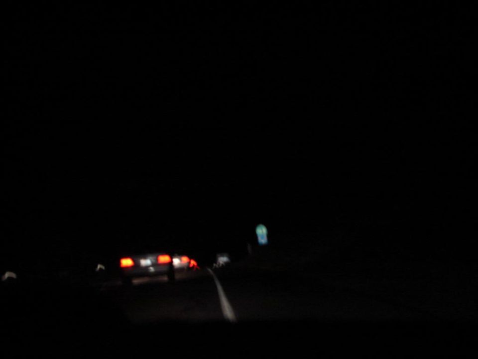 1992 Ford Taurus rear view at night