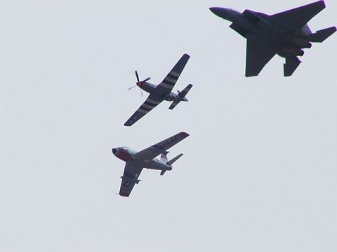 1998 Ford Taurus - P-51 in lead, F-15 left wing, F-86 right wing. It was cool to see those planes fly together. I had some video but it sucked.